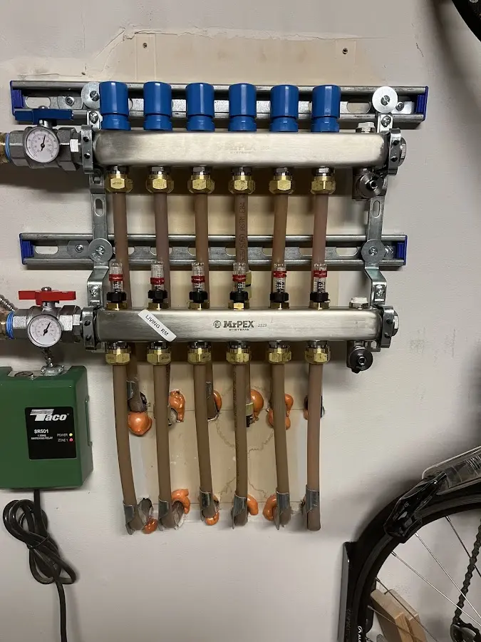 Plumber performing Gas Line Installation at a residential property in Bolton